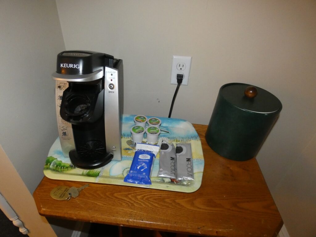 Coffee makers are among the amenities in North Hero House Rooms 