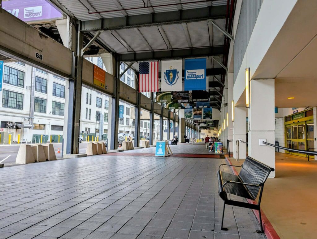 Bench in open air space that is the cruise terminal in Boston