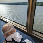 baby looking out window