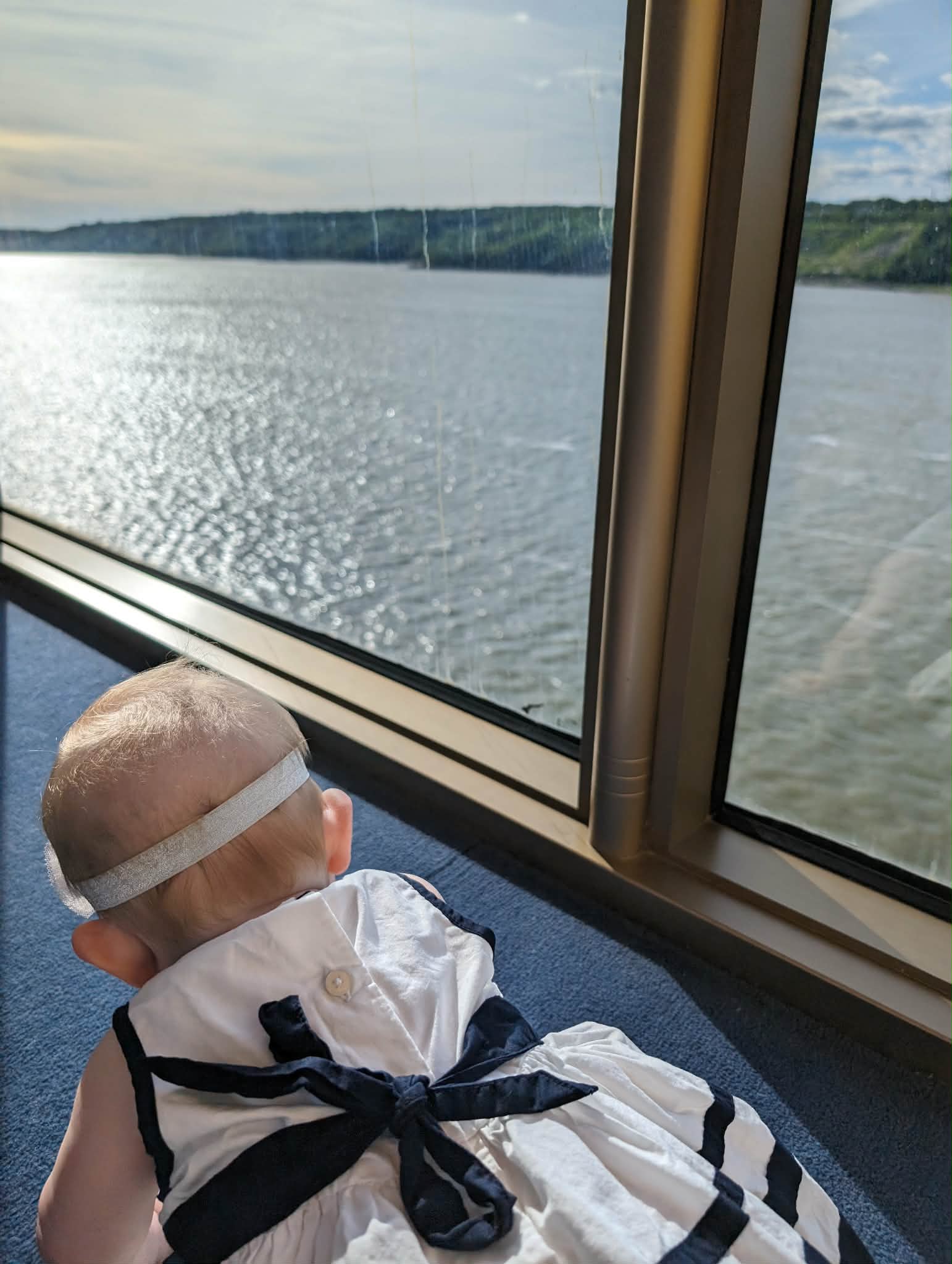 baby looking out window